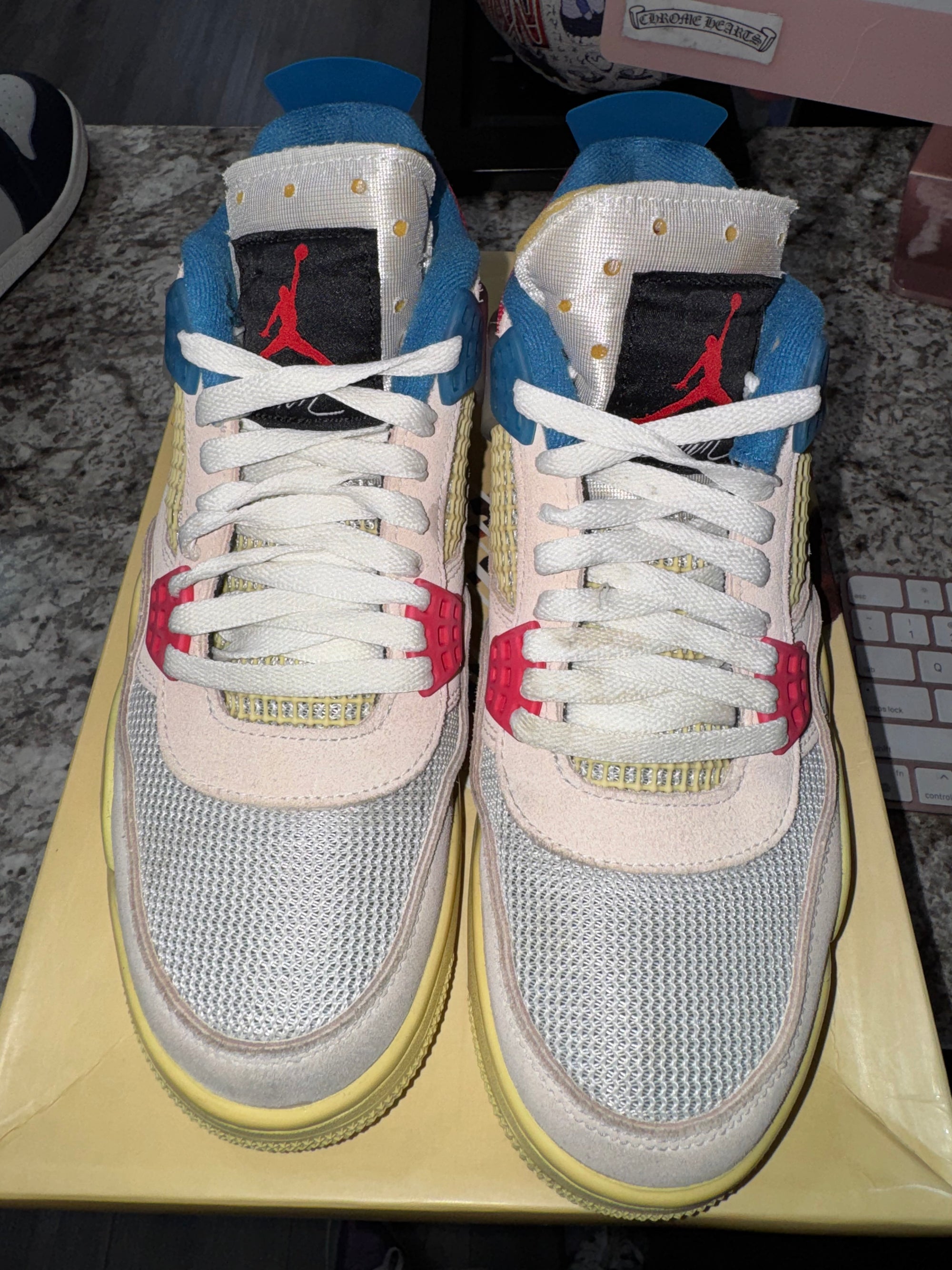 Jordan 4 Retro Union Guava Ice