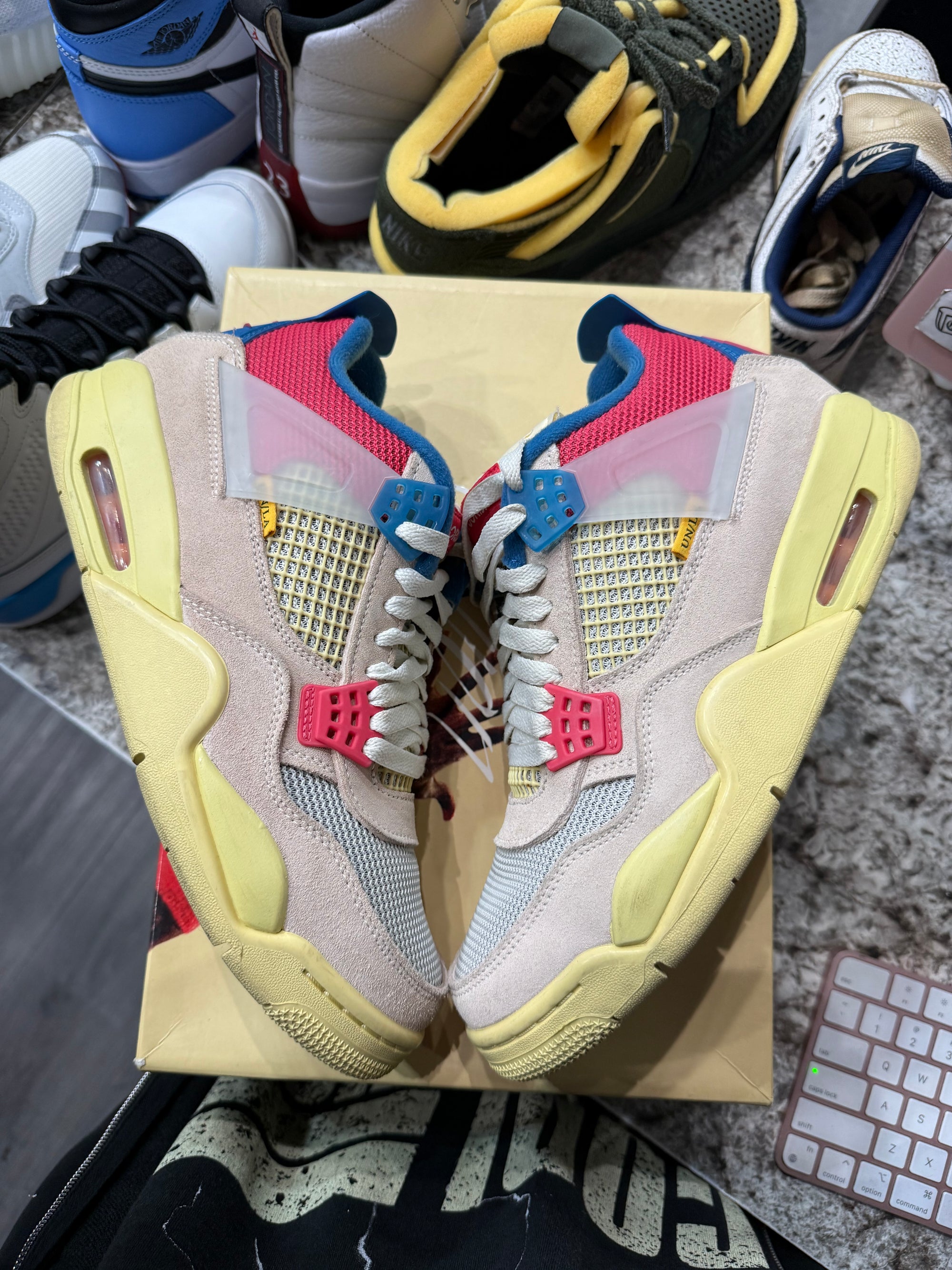 Jordan 4 Retro Union Guava Ice