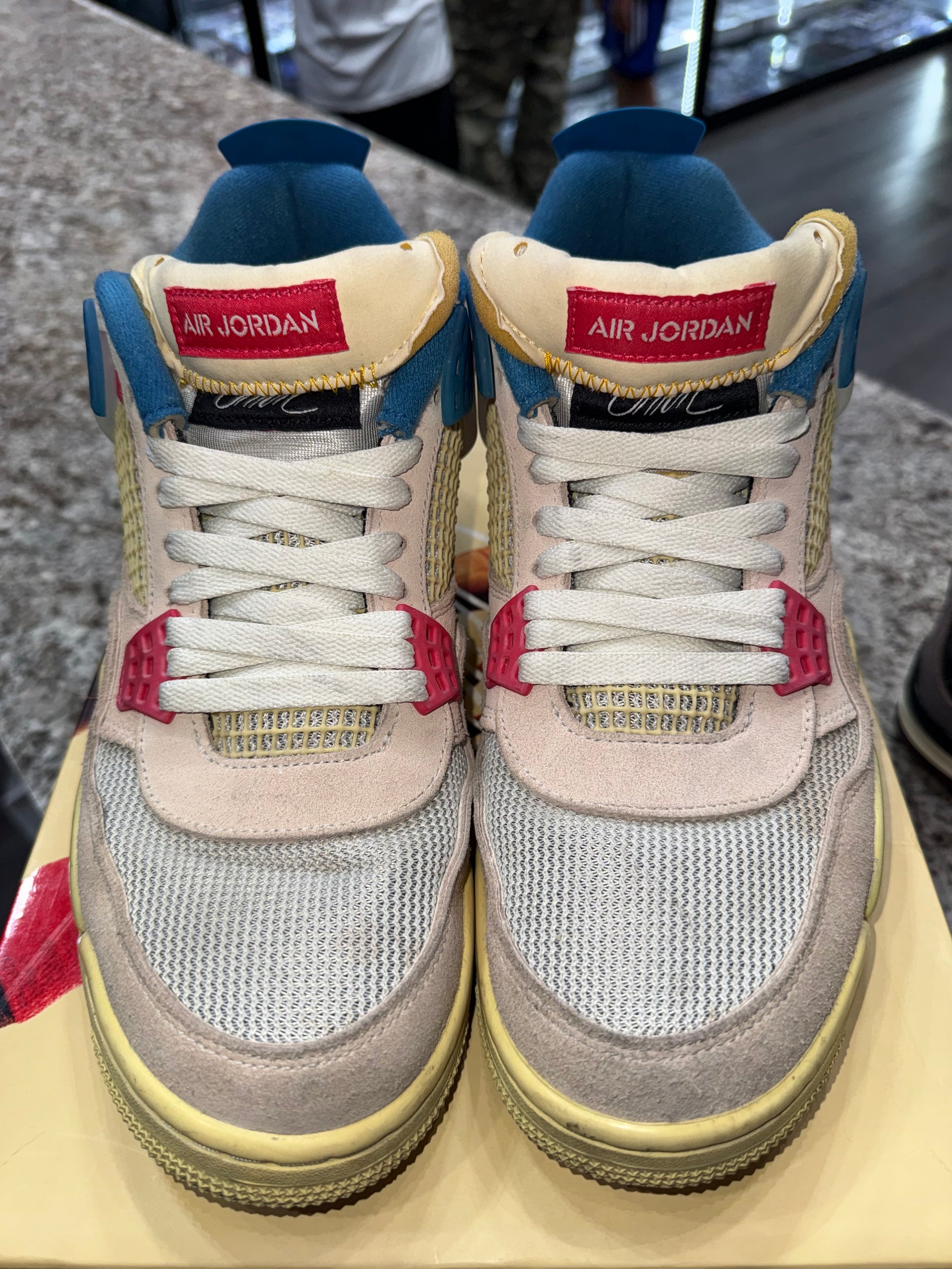 Jordan 4 Retro Union Guava Ice