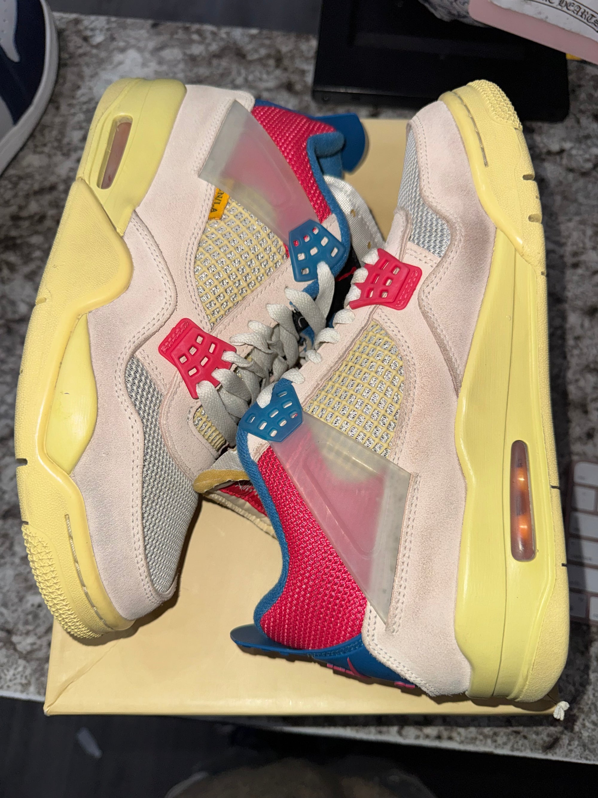 Jordan 4 Retro Union Guava Ice