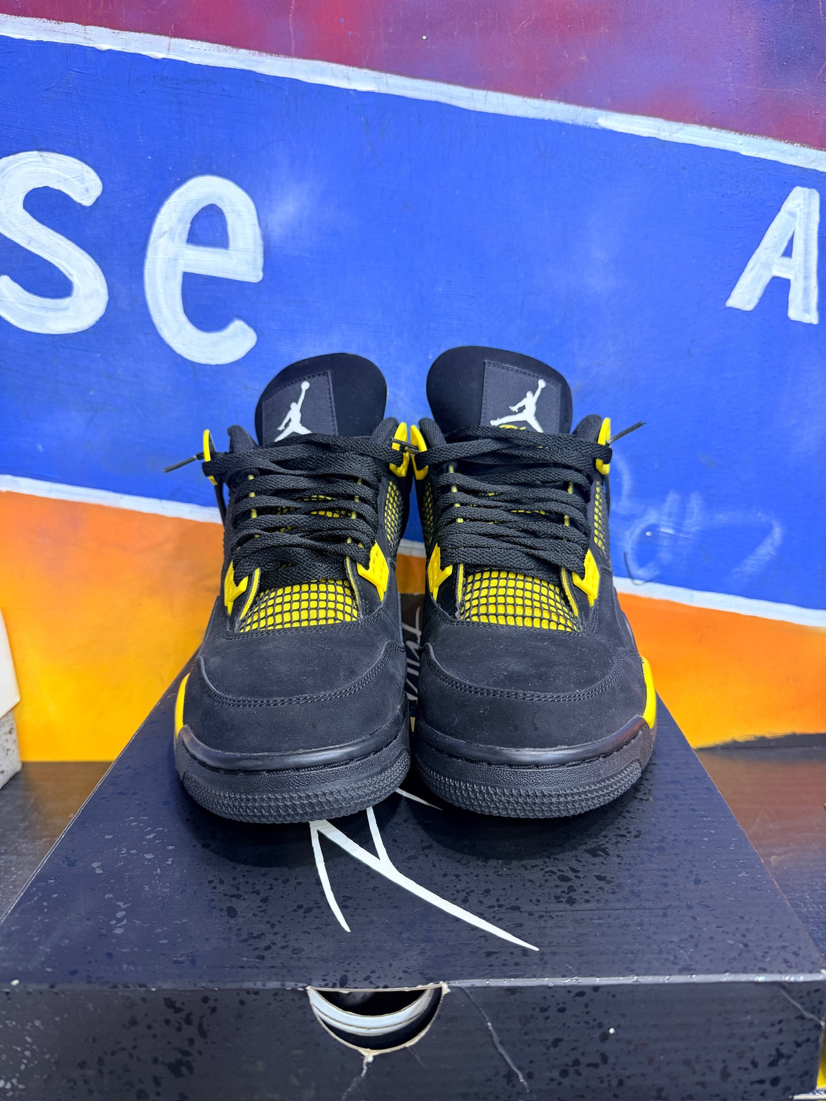 Jordan 4 Retro Thunder (2023)