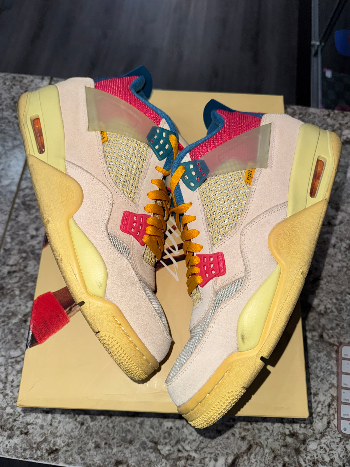 Jordan 4 Retro Union Guava Ice