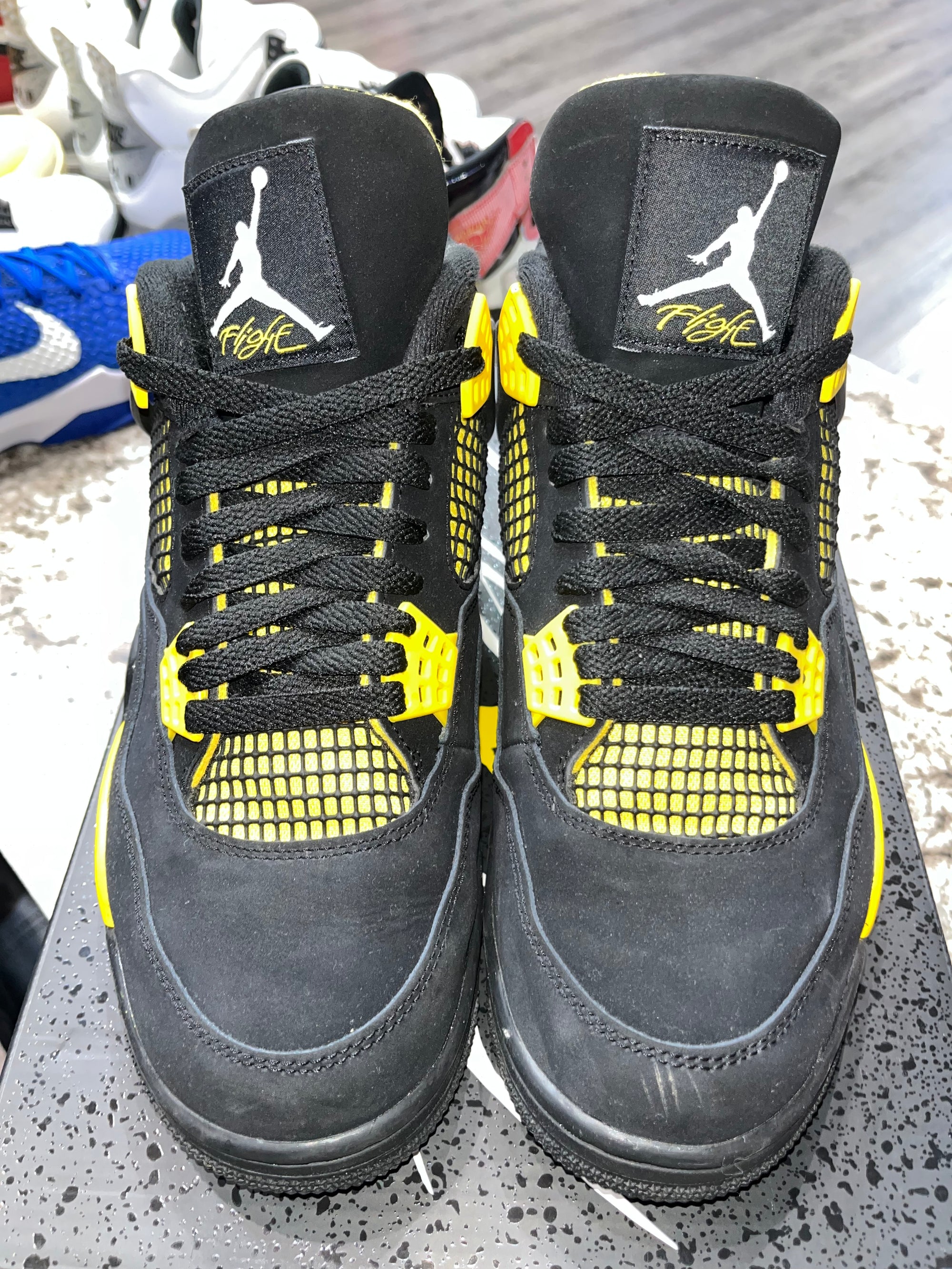 Jordan 4 Retro Thunder (2023)