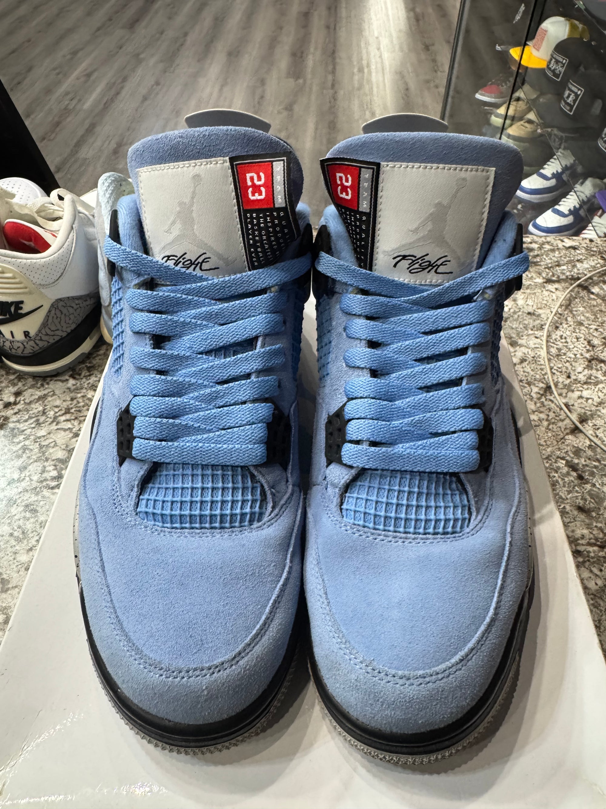 Jordan 4 Retro University Blue (Damaged Box)