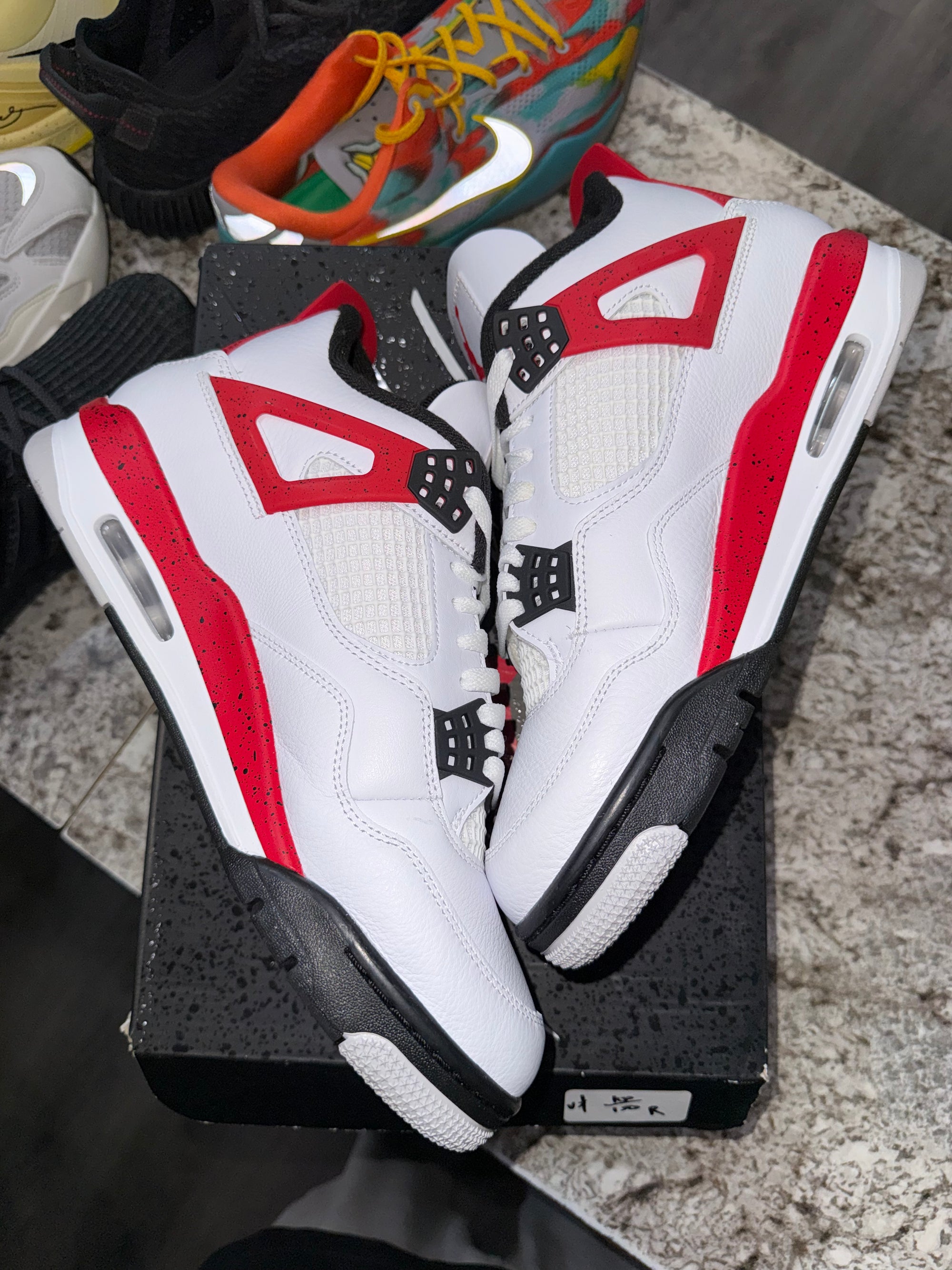 Jordan 4 Retro Red Cement