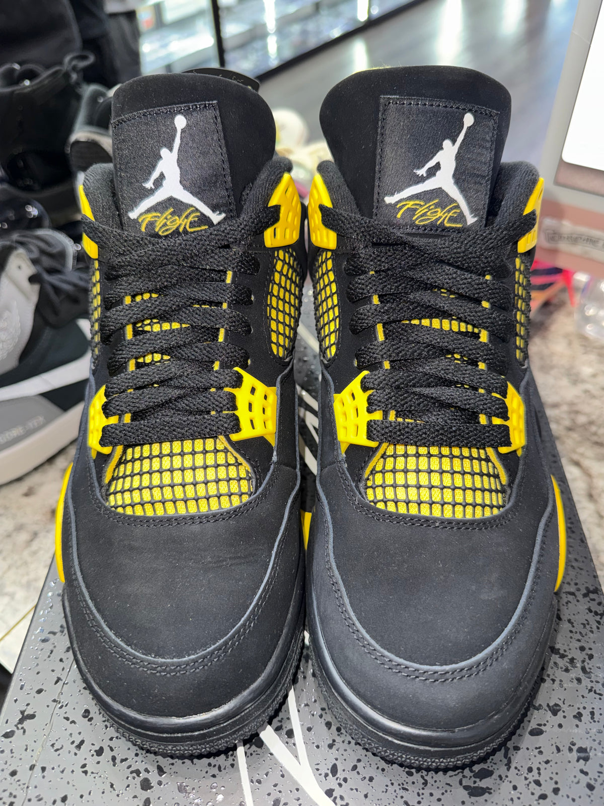 Jordan 4 Retro Thunder (2023)