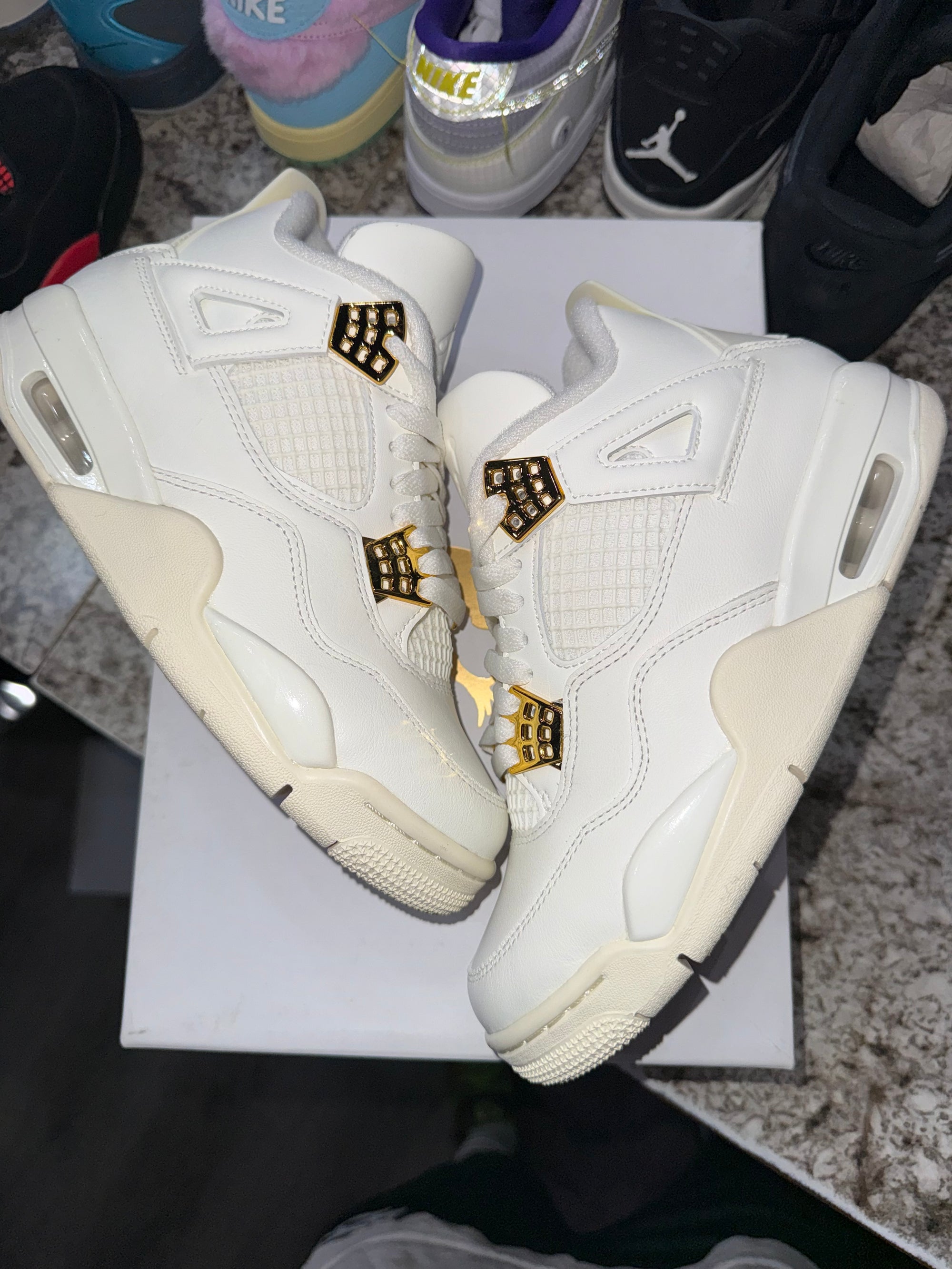 Jordan 4 Retro Metallic Gold (Women's)