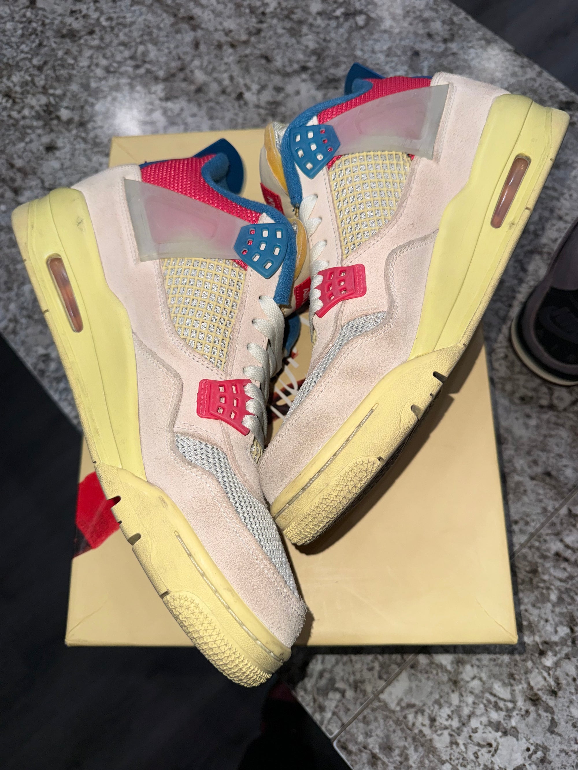 Jordan 4 Retro Union Guava Ice