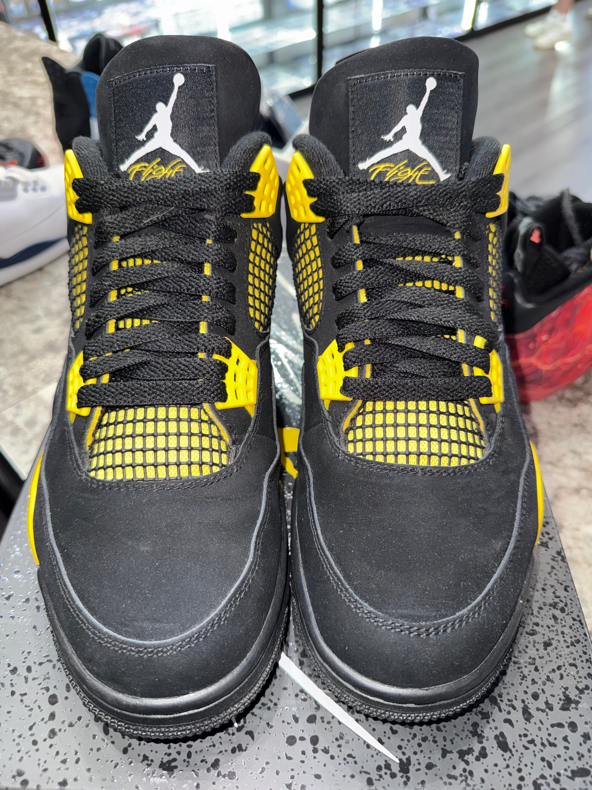 Jordan 4 Retro Thunder (2023)