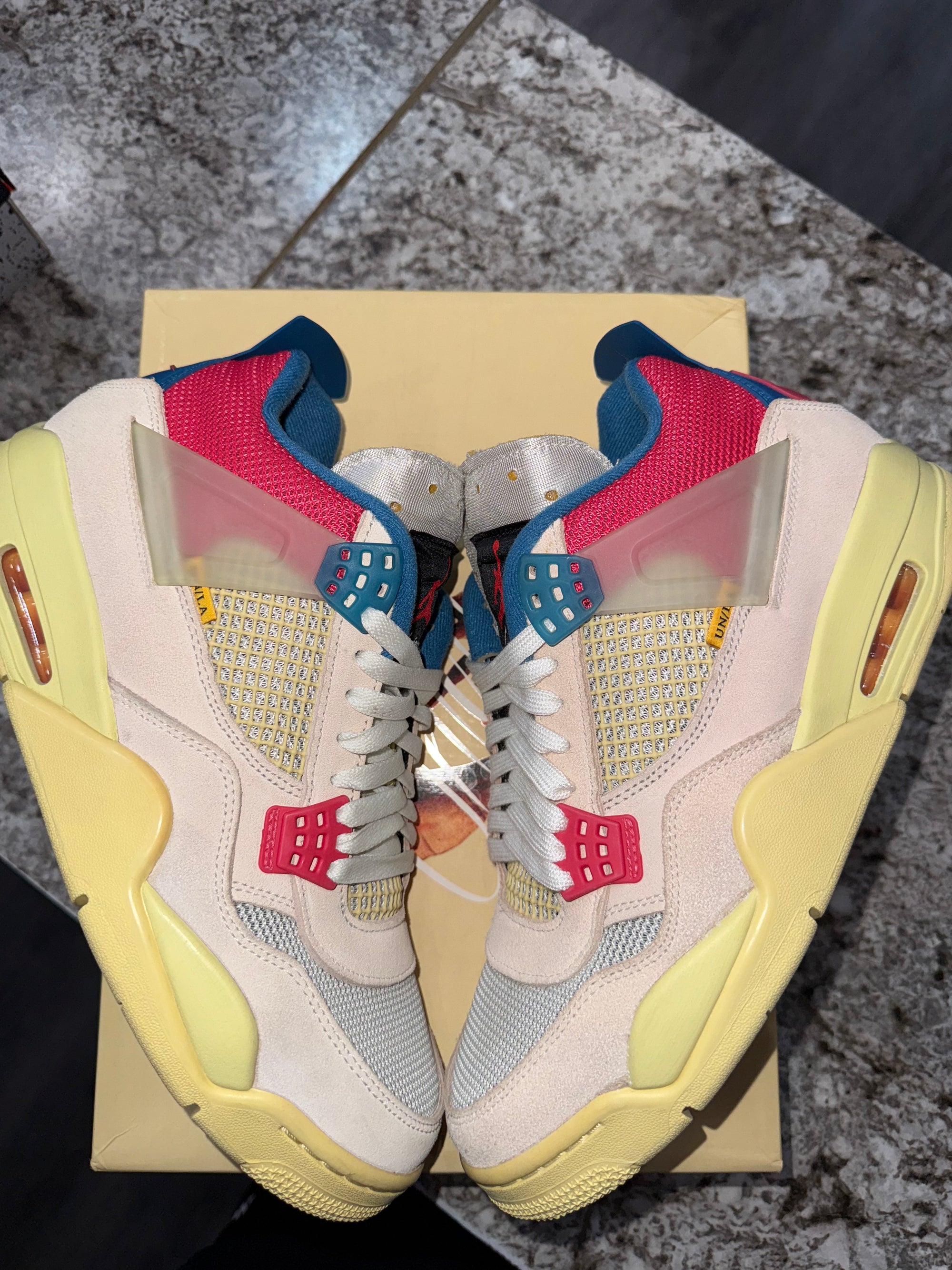 Jordan 4 Retro Union Guava Ice