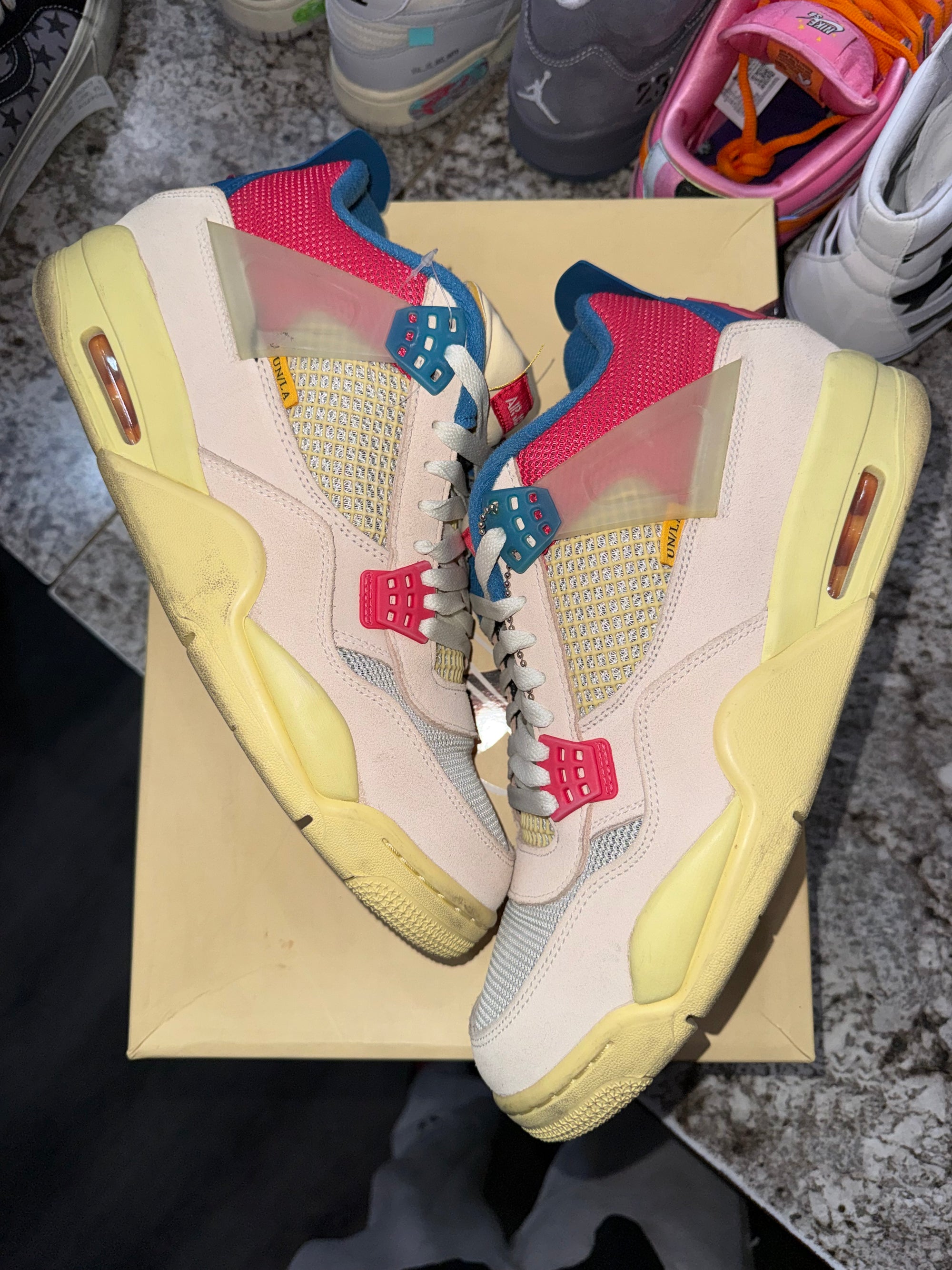 Jordan 4 Retro Union Guava Ice