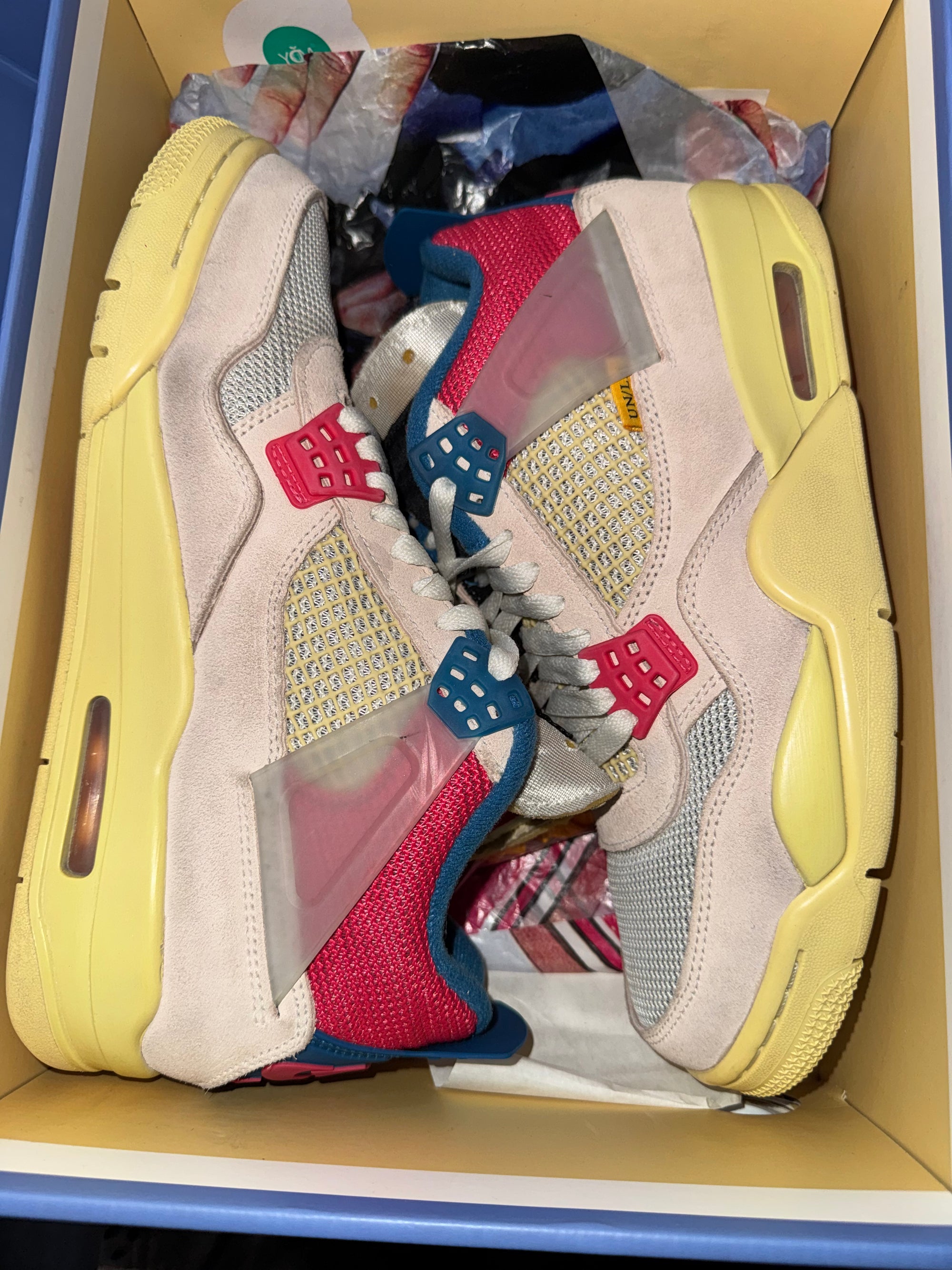 Jordan 4 Retro Union Guava Ice