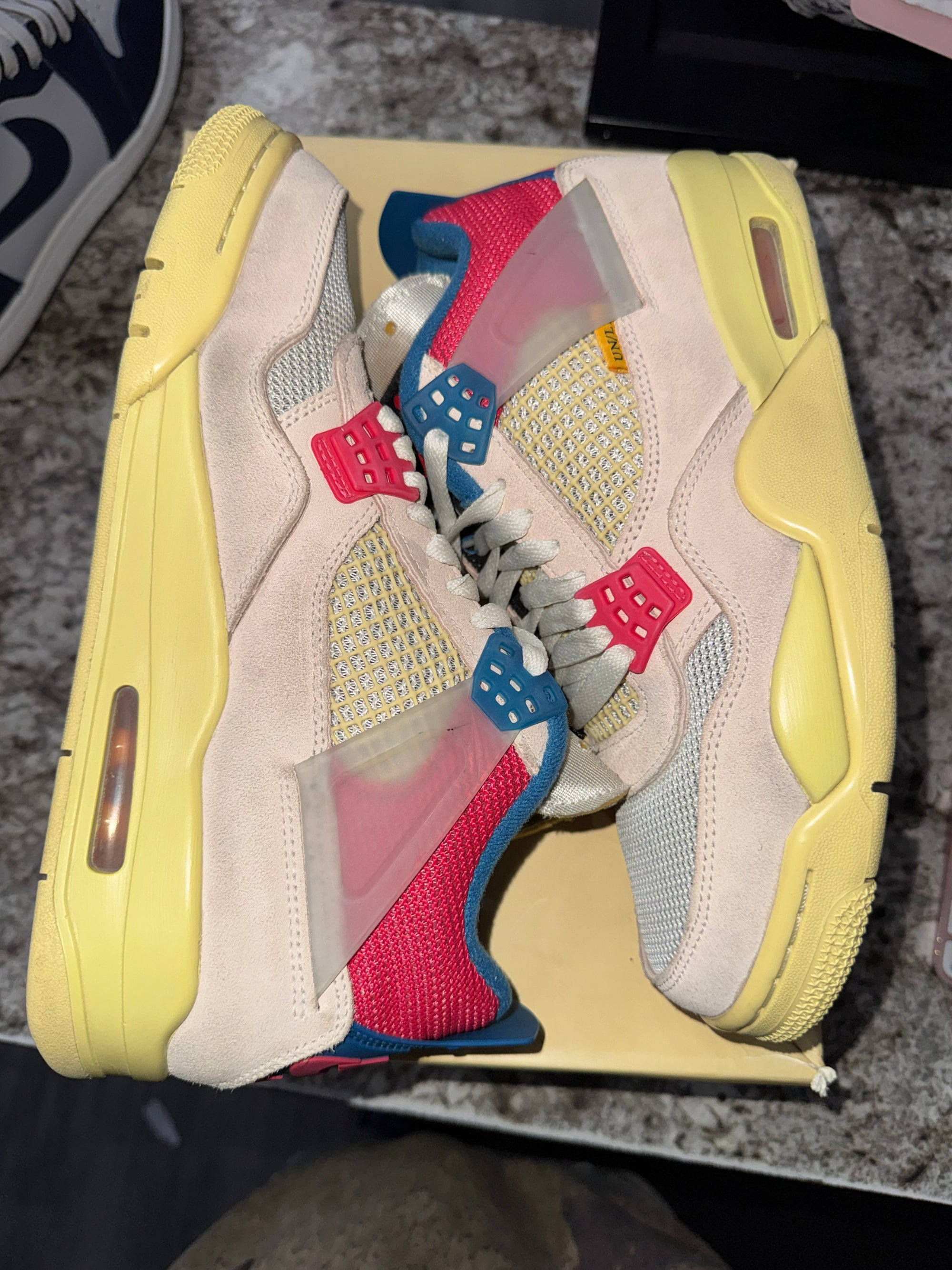 Jordan 4 Retro Union Guava Ice