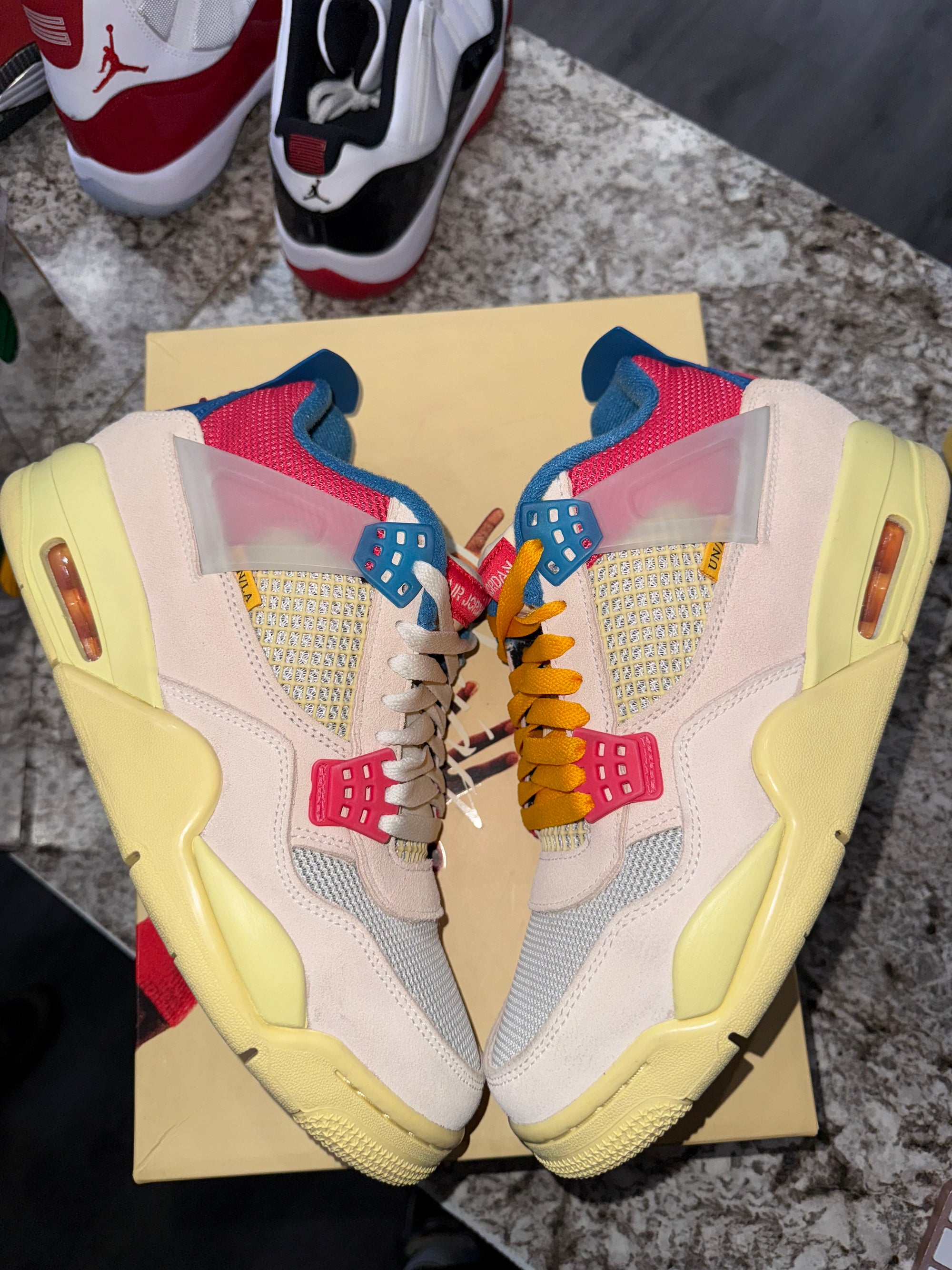 Jordan 4 Retro Union Guava Ice