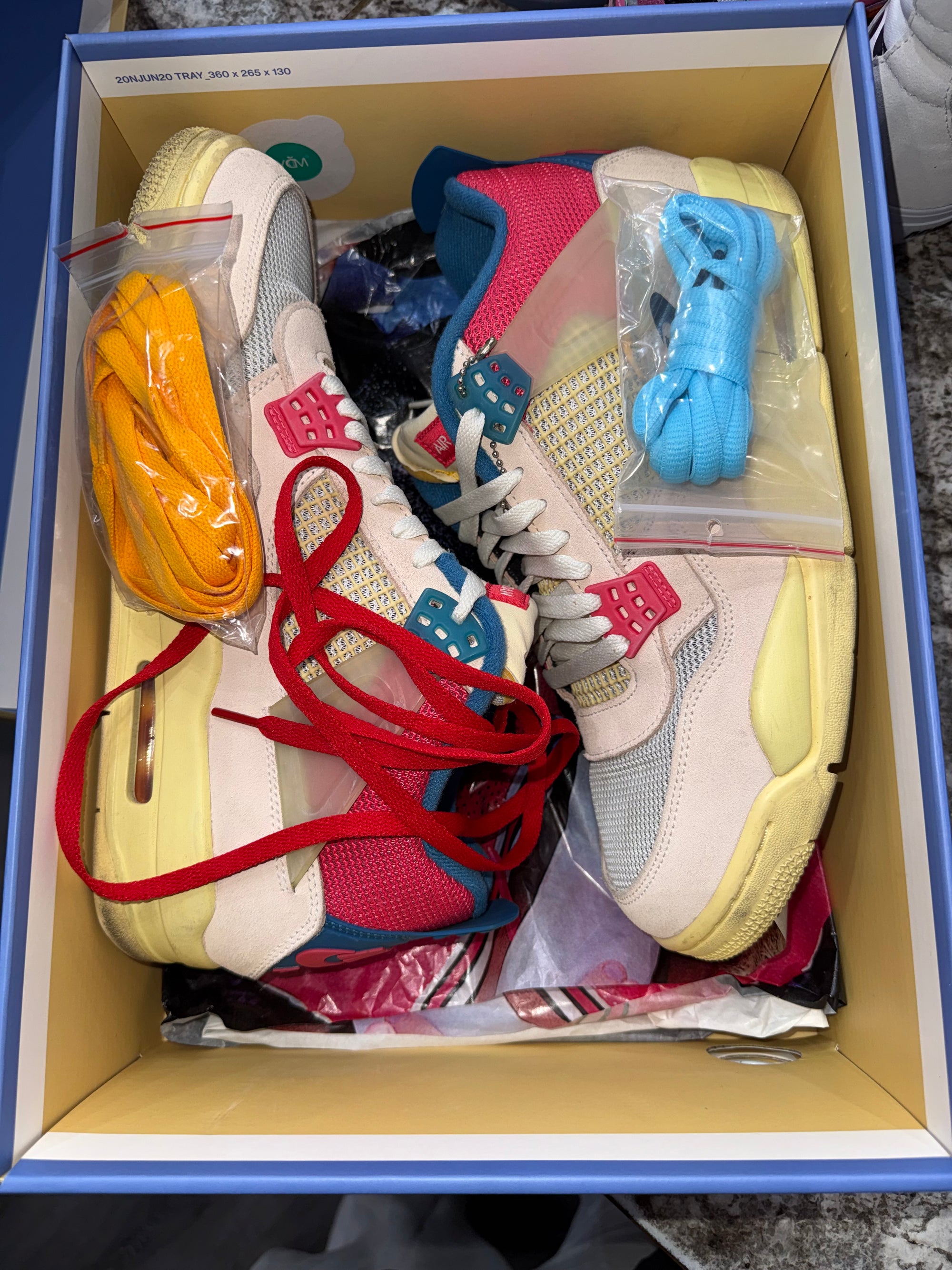 Jordan 4 Retro Union Guava Ice