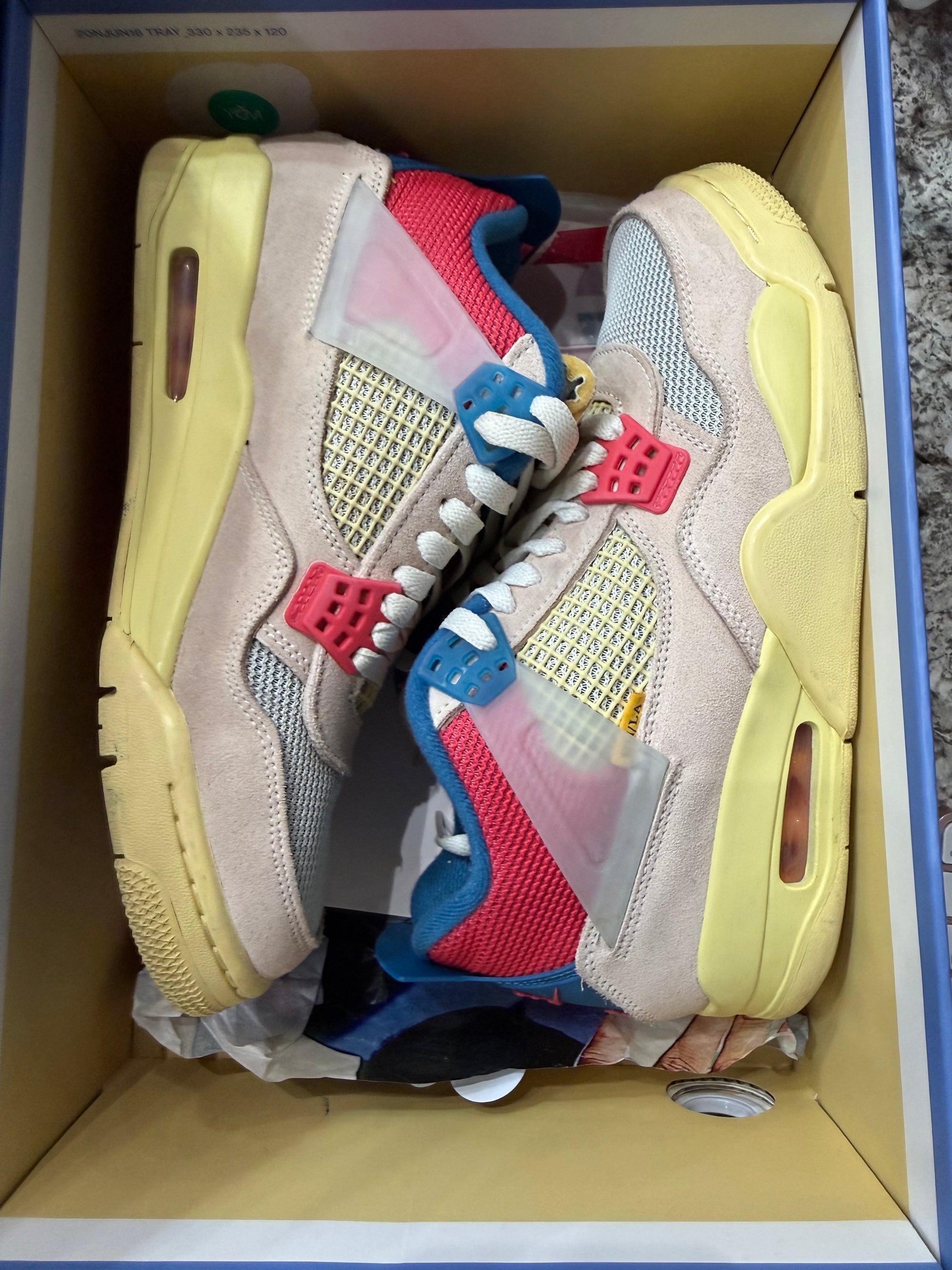 Jordan 4 Retro Union Guava Ice