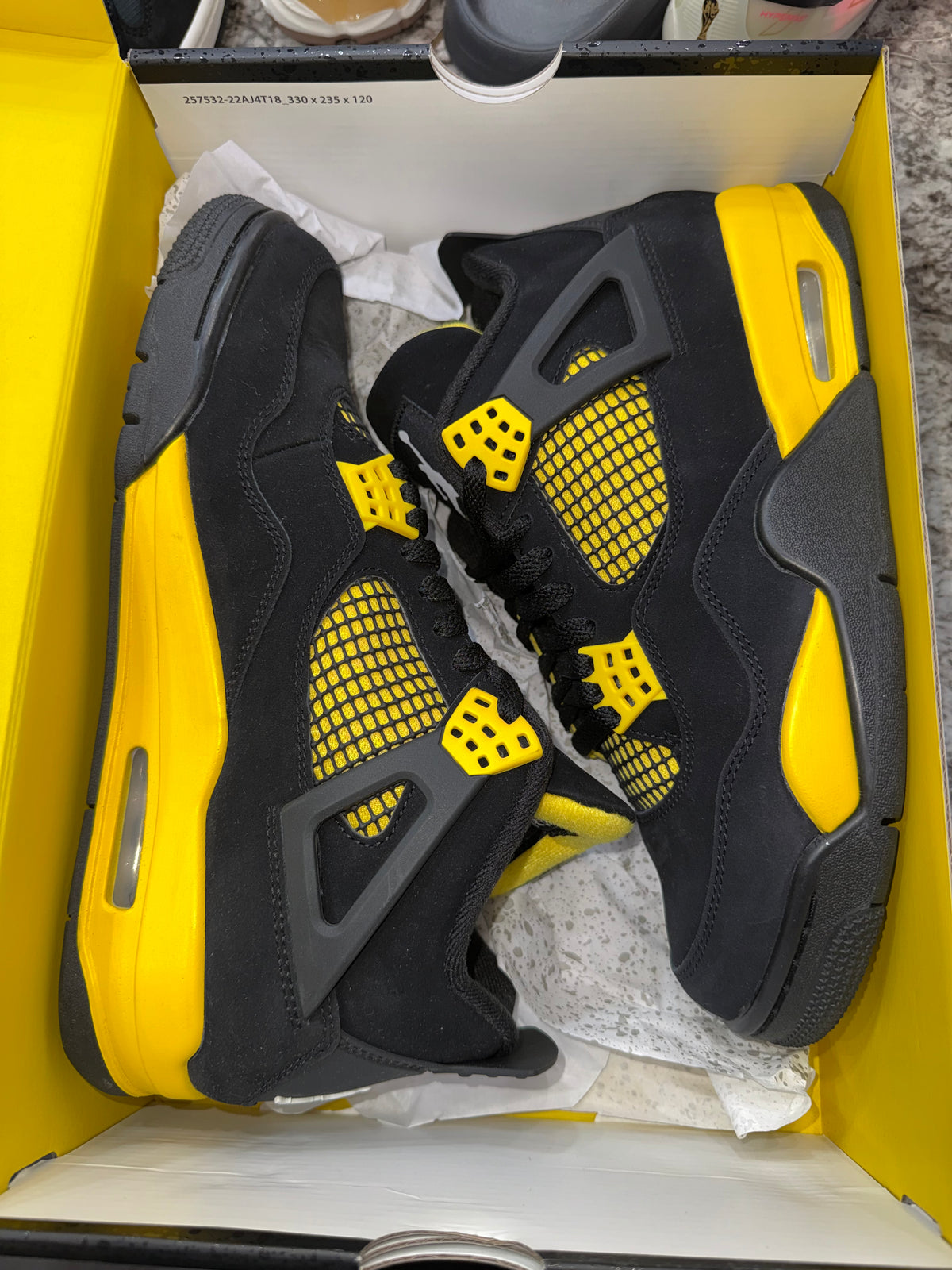 Jordan 4 Retro Thunder (2023)