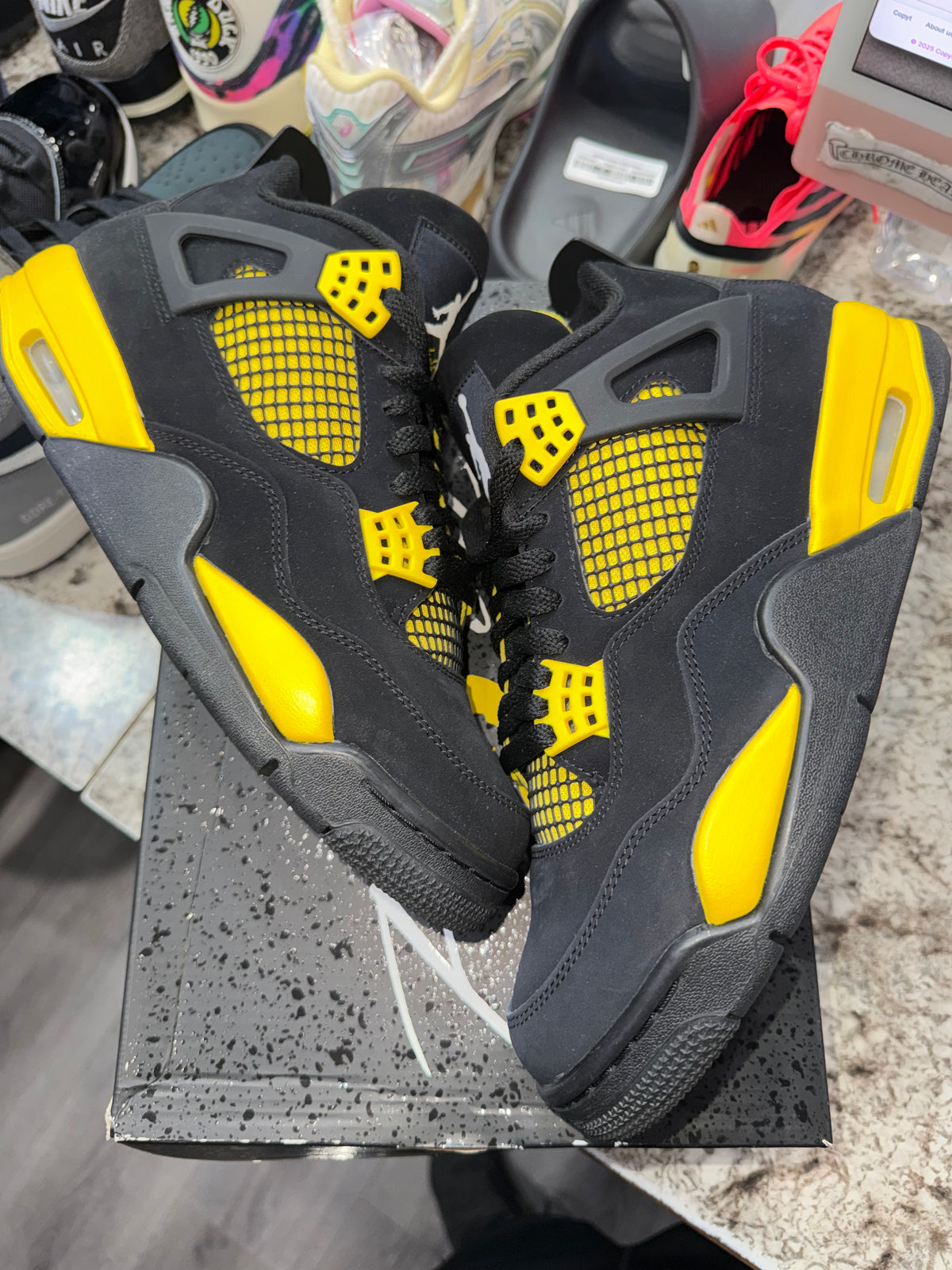 Jordan 4 Retro Thunder (2023)
