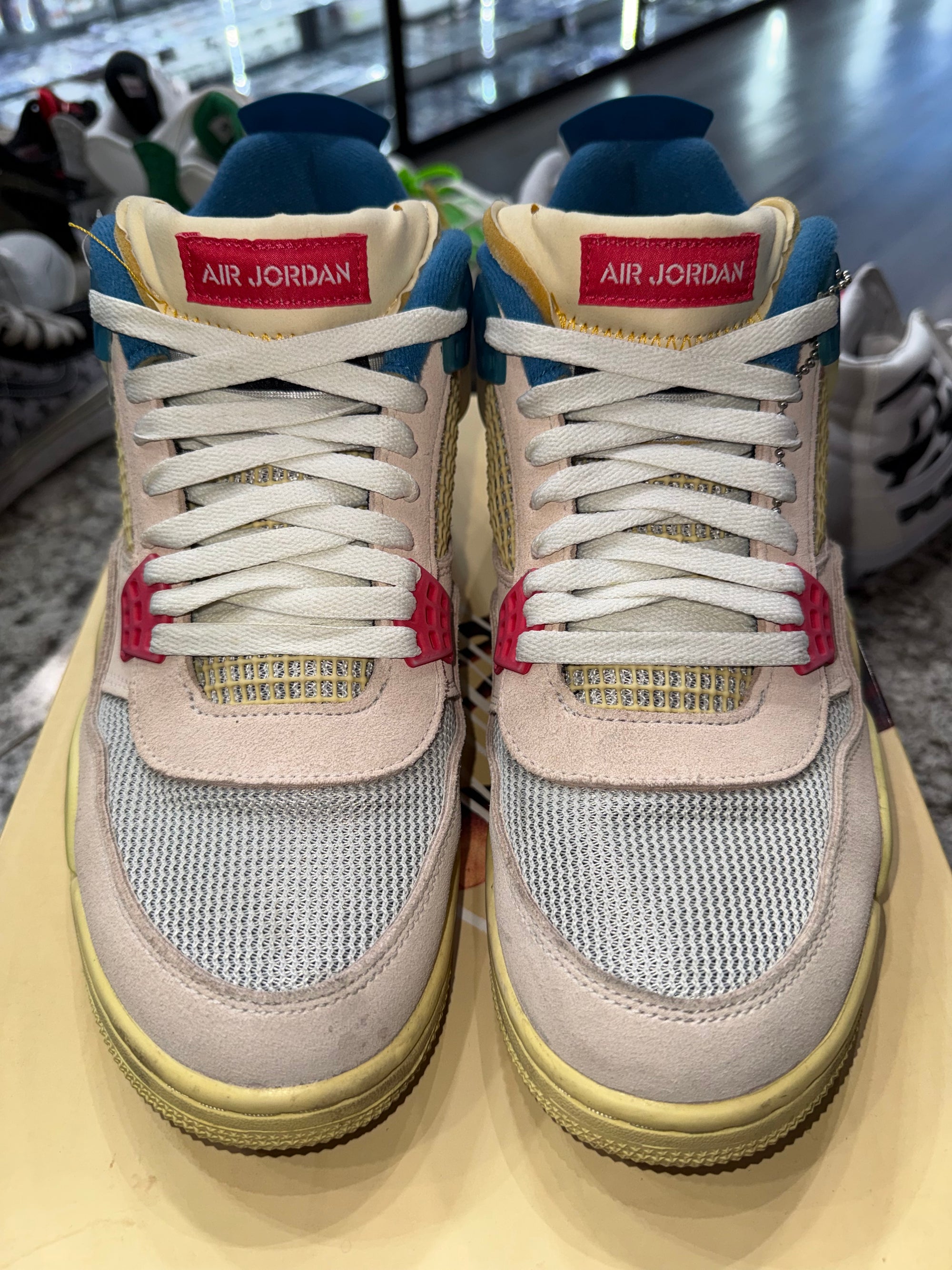 Jordan 4 Retro Union Guava Ice