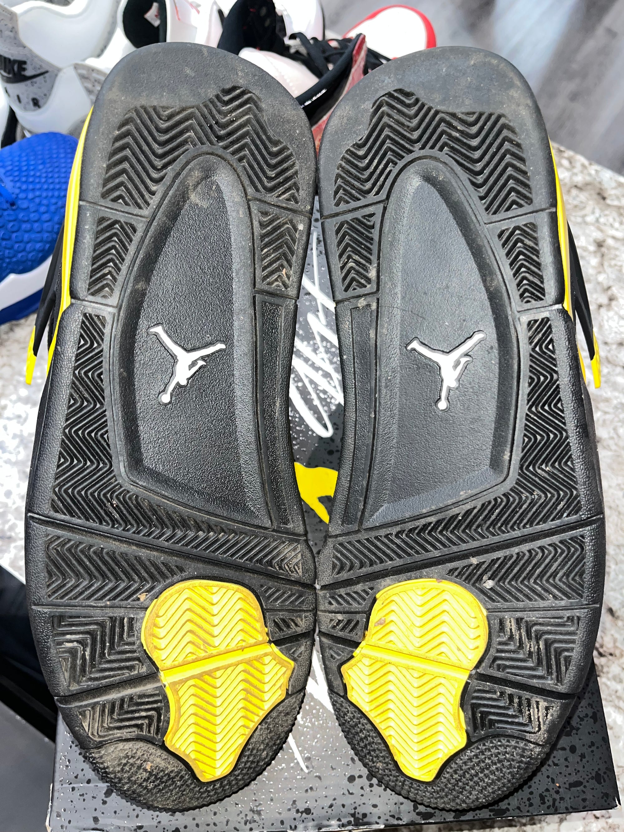 Jordan 4 Retro Thunder (2023)
